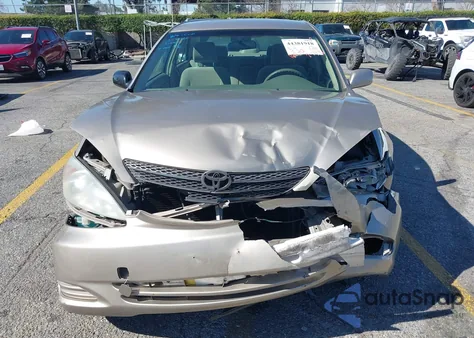 2002 Toyota Camry Le from USA, damaged, VIN JTDBE32K720052674